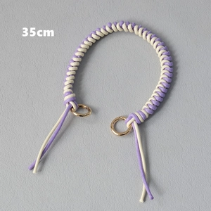 Detail view of 35cm purple and white braided rope handbag chain with gold rings