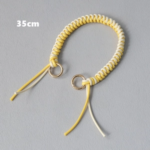 35cm hand-woven bag handle with yellow and white cords and gold metal rings