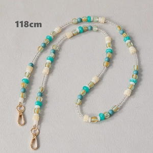 Detail of 118cm colorful acrylic beaded strap with golden lobster clasps for bags