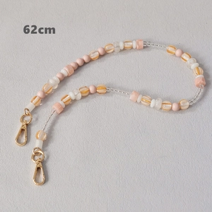 Detail of 62cm colorful acrylic beaded lanyard strap with golden metal lobster clasps