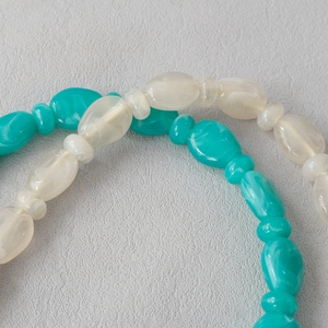 Macro shot of colorful acrylic marble beads for shoulder straps and jewelry chains