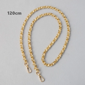 Detail of 120cm light gold metal chain interwoven with cream leather and lobster clasps
