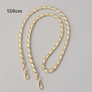 Close-up of 120cm gold chain strap with white leather weaving and lobster clasps
