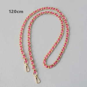 Detail of 120cm gold metal chain interwoven with rose pink leather and lobster clasps