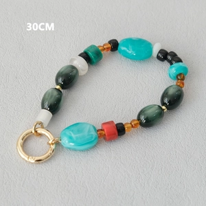 Dettaglio catena di perline colorate da 30cm con perle occhio di gatto e chiusura oro