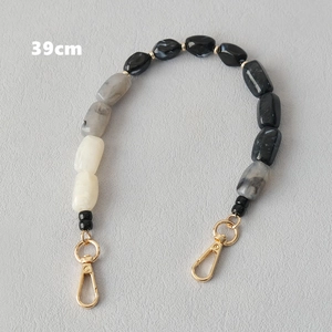 Detail of 39cm marble texture acrylic beaded strap with gold metal swivel lobster clasps