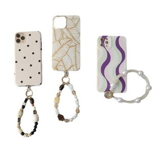 Three acrylic beaded phone straps with vintage pattern cases and gold lobster clasps