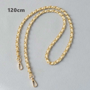 Detail showing 120cm light gold metal chain woven with cream white leather and lobster clasps