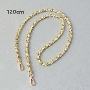 Detailed view of 120cm gold chain strap with beige leather and metal lobster clasps