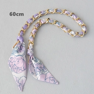 Detail of 60cm gold chain strap woven with purple floral silk scarf for handbags