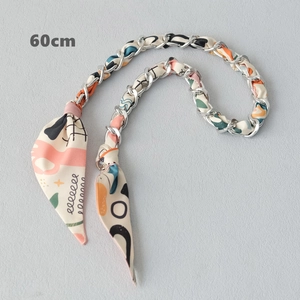 Detail of 60cm silk scarf chain strap for handbags featuring silver metal weaving