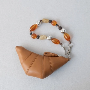 Caramel croissant mini bag with amber resin beads and silver metallic chain strap