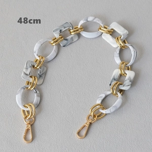 Detail view of 48cm marble texture acrylic resin purse strap with gold metal rings