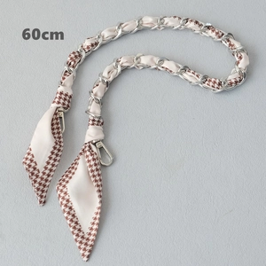 Close-up of 60cm silver metal chain woven with brown houndstooth fabric for handbags