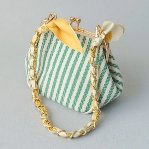 Retro green striped kiss-lock handbag with gold chain and floral silk scarf handle
