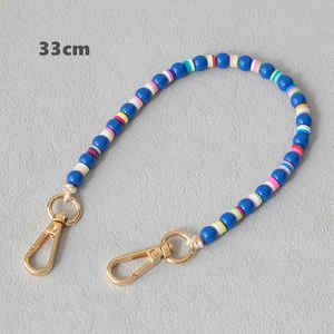 Detailed view of 33cm colorful acrylic beaded chain with gold metal lobster clasps