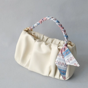 Chic cream ruched cloud handbag with floral silk scarf handle and gold chain accents