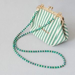 Green and white striped canvas clasp bag with colorful beaded strap and the main embroidery