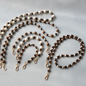 Crossbody acrylic and wooden bead phone strap with golden lobster clasps for bags