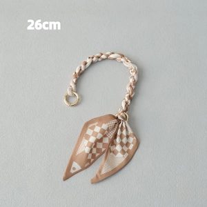 Detail of 26cm scarf woven bag handle chain with gold round metal rings for handbags