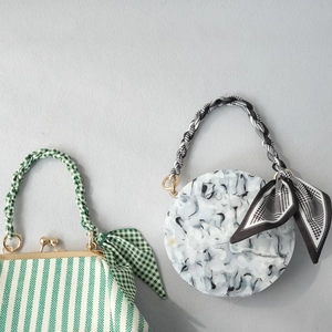 Fashionable scarf handle handbag chain with marble acrylic bag and striped clutch