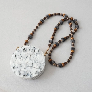 Chic round marble acrylic crossbody bag with beaded wooden and faux fur strap