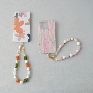 Coques de téléphone à fleurs et vagues avec dragonnes en perles acryliques colorées