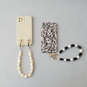 Chaînes de téléphone en perles acryliques avec coques à chevrons et motifs floraux