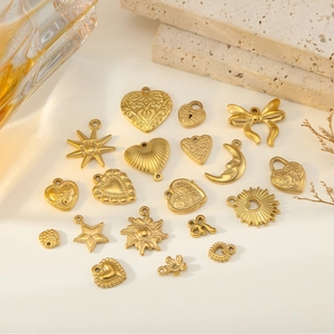 Detailed collection of 18K gold plated heart and bow charms for jewelry making