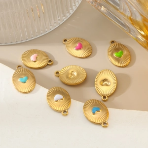 Gold plated stainless steel oval pendants with colorful heart enamel in sunburst texture