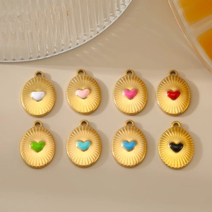 Gold-plated stainless steel sunburst oval pendants with colorful heart enamel inlay