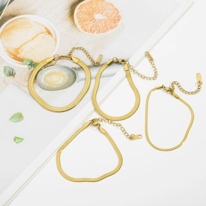 Detail of 18K gold plated 316L stainless steel flat snake chains with lobster clasps