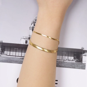 Double-layered 18K gold plated snake bone chain bracelet for women on wrist