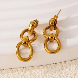 Boucles d'oreilles minimalistes double anneau en acier inoxydable doré sur socle