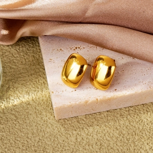 Minimalist rectangular gold stud earrings with a polished mirror finish on silk base