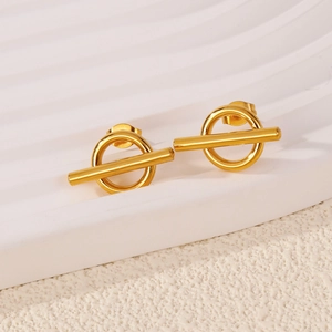 French minimalist gold-plated geometric OT earrings on a white wave-textured display