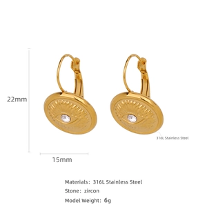 Boucles d'oreilles œil protecteur en acier plaqué or 18k avec zircon et détails rayons