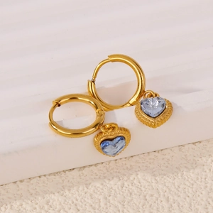 18k gold hoop earrings with blue heart-shaped crystal pendants and beaded edge details