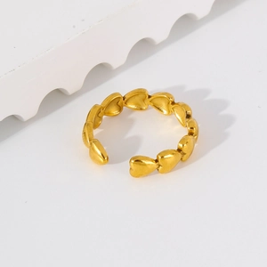 Detailed view of 18k gold plated stainless steel ring with linked heart design