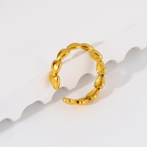 Detail of 18k gold plated stainless steel ring with continuous heart design and open band