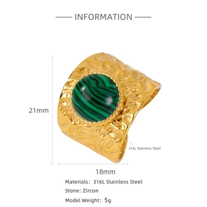Macro detail of 18K gold plated hammered ring featuring a green turquoise stone inlay