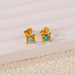 Exquisite gold clover stud earrings featuring round larimar stones with star setting