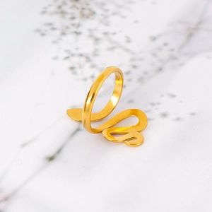 Detailed macro view of 18k gold-plated stainless steel snake-shaped wrap ring