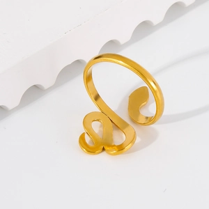Macro shot of gold-plated stainless steel snake ring with a polished mirror finish surface