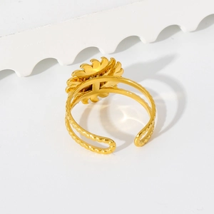 Detailed close-up of golden sunflower open ring with dual-layered镂空 bands and turquoise