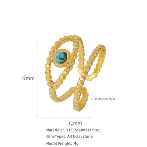 Gold plated stainless steel open ring with turquoise stone and bead texture detail