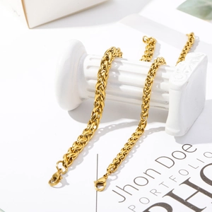 Golden dragon bone chain bracelet in stainless steel wrapped on decorative white pillars