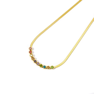 Detailed close-up of golden flat snake chain necklace with colorful round stones