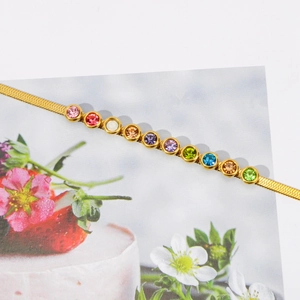 Gold-plated snake chain necklace with vibrant rainbow zircon gemstones in a bezel setting