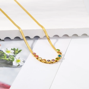 Gold-plated snake chain necklace with vibrant rainbow zircon inlay on a curved pendant